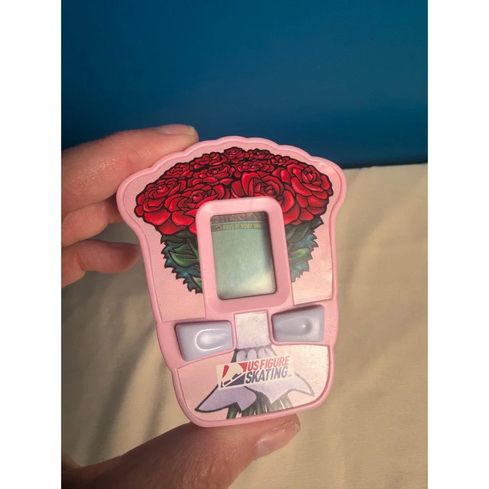Vintage 2005 Burger King US Figure Skating Handheld Electronic Game Roses works
